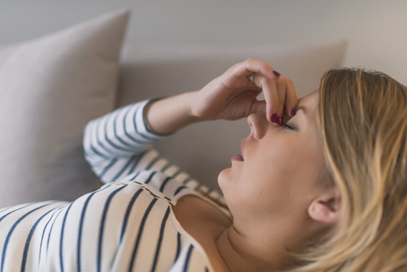 Woman with migraine pain