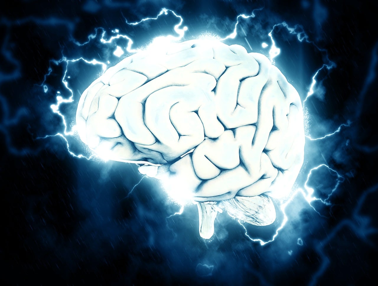 Neuromodulation. A brain with electrical signals.