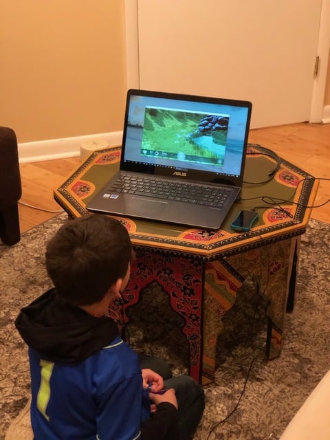 Unyte child practicing at home